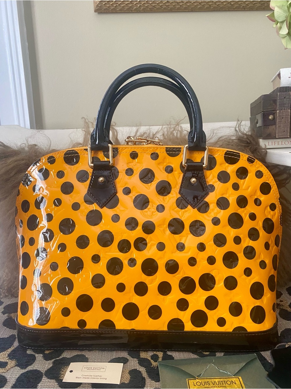 Limited edition mirror image patent leather polka dot Almaa bag